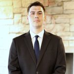 Attoreny John Noonan of Axis Legal Wisconsin's Spanish Speaking Work Comp Attorney